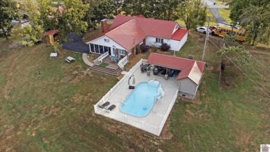 This private *WATERFRONT OASIS OVERLOOKING LAKE BARKLEY* awaits on Boots Randolph Golf Course in Kentucky - for sale on GolfHomes.com, golf home, golf lot
