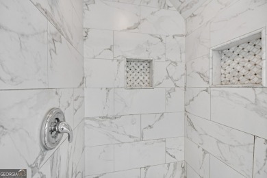Welcome to this exquisite John Weiland-designed estate, where on Reunion Golf Club in Georgia - for sale on GolfHomes.com, golf home, golf lot
