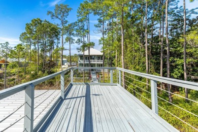 Welcome to your dream coastal retreat, nestled on the serene on Sandestin Golf and Beach Resort - Raven in Florida - for sale on GolfHomes.com, golf home, golf lot