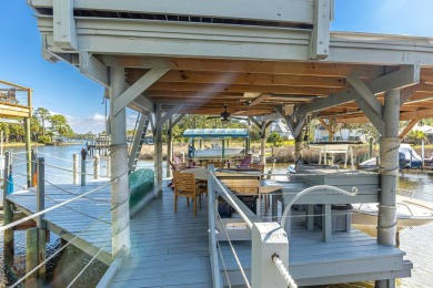 Welcome to your dream coastal retreat, nestled on the serene on Sandestin Golf and Beach Resort - Raven in Florida - for sale on GolfHomes.com, golf home, golf lot