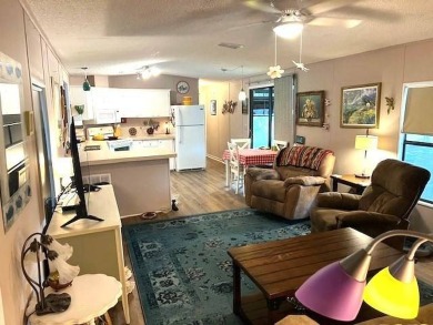 Discover this lovely furnished 2-bedroom, 2-bathroom single-wide on Crystal Lake Club in Florida - for sale on GolfHomes.com, golf home, golf lot