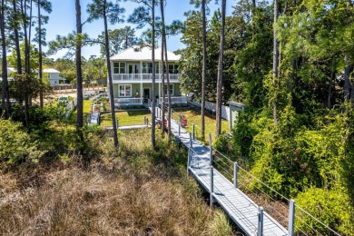 Welcome to your dream coastal retreat, nestled on the serene on Sandestin Golf and Beach Resort - Raven in Florida - for sale on GolfHomes.com, golf home, golf lot