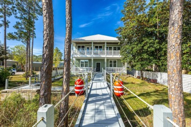 Welcome to your dream coastal retreat, nestled on the serene on Sandestin Golf and Beach Resort - Raven in Florida - for sale on GolfHomes.com, golf home, golf lot
