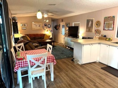 Discover this lovely furnished 2-bedroom, 2-bathroom single-wide on Crystal Lake Club in Florida - for sale on GolfHomes.com, golf home, golf lot