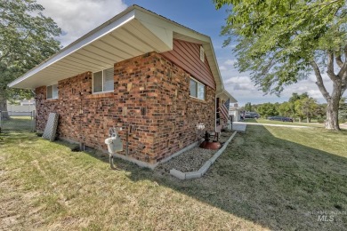 Discover this charming all brick residence brimming with on Fairview Golf Course in Idaho - for sale on GolfHomes.com, golf home, golf lot