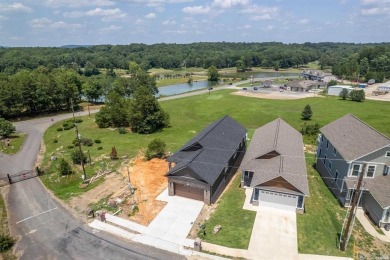 THIS HOME WILL QUALIFY FOR ZERO DOWN 100% FINANCING WITH RURAL on Diamondhead Golf and Country Club in Arkansas - for sale on GolfHomes.com, golf home, golf lot