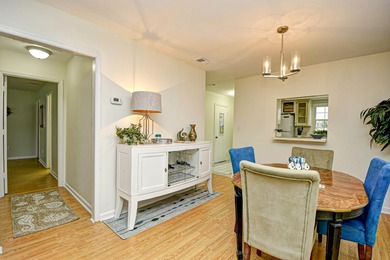 Discover easy coastal living in this beautifully maintained on Heron Point Golf Club in South Carolina - for sale on GolfHomes.com, golf home, golf lot