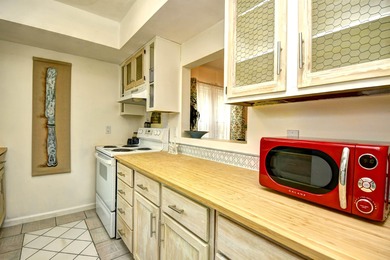 Discover easy coastal living in this beautifully maintained on Heron Point Golf Club in South Carolina - for sale on GolfHomes.com, golf home, golf lot