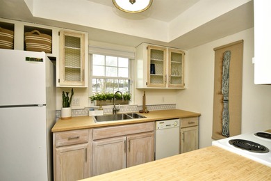 Discover easy coastal living in this beautifully maintained on Heron Point Golf Club in South Carolina - for sale on GolfHomes.com, golf home, golf lot