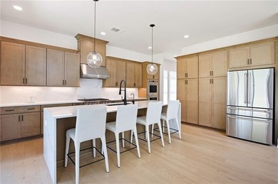 Welcome home to this executive home built by the Toll Brothers on Capital City Club Crabapple in Georgia - for sale on GolfHomes.com, golf home, golf lot