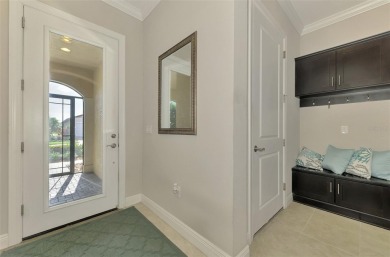 Prepare to be impressed by this meticulously maintained on Sarasota National Golf Club in Florida - for sale on GolfHomes.com, golf home, golf lot