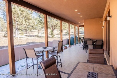 Southwest elegance meets resort living in this Santa Fe style on Alto Lakes Golf and Country Club in New Mexico - for sale on GolfHomes.com, golf home, golf lot