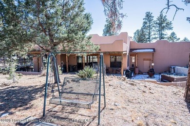 Southwest elegance meets resort living in this Santa Fe style on Alto Lakes Golf and Country Club in New Mexico - for sale on GolfHomes.com, golf home, golf lot