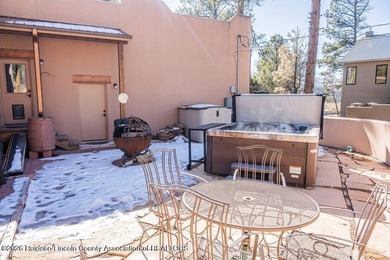 Southwest elegance meets resort living in this Santa Fe style on Alto Lakes Golf and Country Club in New Mexico - for sale on GolfHomes.com, golf home, golf lot