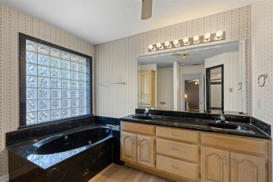 Discover the potential of this charming home featuring a great on De Cordova Bend Country Club in Texas - for sale on GolfHomes.com, golf home, golf lot