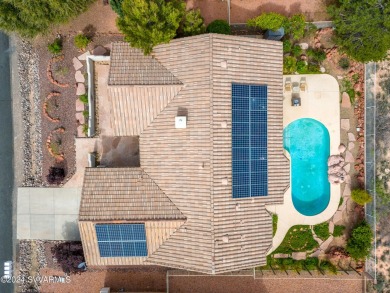 Splash into summer with a private heated pool, mature on Verde Santa Fe Golf Club in Arizona - for sale on GolfHomes.com, golf home, golf lot