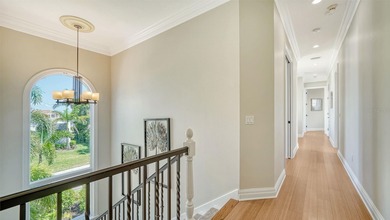 Experience elevated coastal living in this updated, elegantly on Links on Longboat Golf Club in Florida - for sale on GolfHomes.com, golf home, golf lot