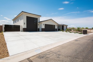 Presenting 6393 S Via De Oro, Fort Mohave, Arizona, a custom on Los Lagos Golf Club in Arizona - for sale on GolfHomes.com, golf home, golf lot