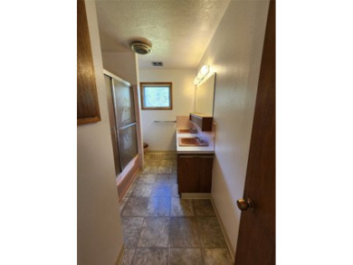 This lovely three-bedroom 2 bath home located in a desirable on Cabinet View Country Club in Montana - for sale on GolfHomes.com, golf home, golf lot