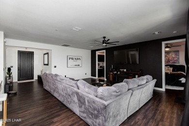 Presenting 6393 S Via De Oro, Fort Mohave, Arizona, a custom on Los Lagos Golf Club in Arizona - for sale on GolfHomes.com, golf home, golf lot