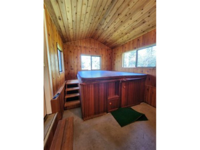 This lovely three-bedroom 2 bath home located in a desirable on Cabinet View Country Club in Montana - for sale on GolfHomes.com, golf home, golf lot