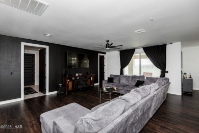 Presenting 6393 S Via De Oro, Fort Mohave, Arizona, a custom on Los Lagos Golf Club in Arizona - for sale on GolfHomes.com, golf home, golf lot