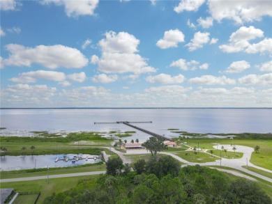 Build your forever home on this beautiful acre property on Indian Lake Estates Golf and Country Club in Florida - for sale on GolfHomes.com, golf home, golf lot