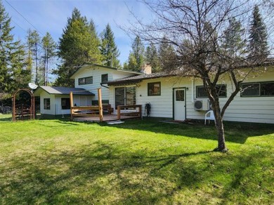 This lovely three-bedroom 2 bath home located in a desirable on Cabinet View Country Club in Montana - for sale on GolfHomes.com, golf home, golf lot