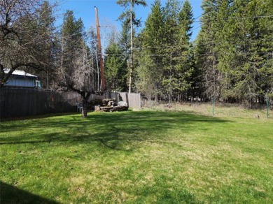 This lovely three-bedroom 2 bath home located in a desirable on Cabinet View Country Club in Montana - for sale on GolfHomes.com, golf home, golf lot