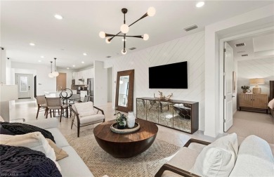 This stunning Hallmark Home Plan offers three spacious bedrooms on Valencia Golf and Country Club in Florida - for sale on GolfHomes.com, golf home, golf lot