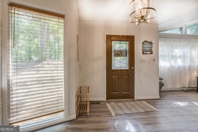 Completely renovated waterfront ranch home with a fully finished on Turtle Cove Golf Course in Georgia - for sale on GolfHomes.com, golf home, golf lot