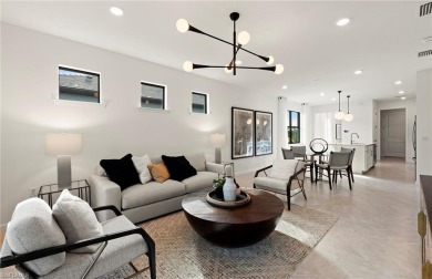 This stunning Hallmark Home Plan offers three spacious bedrooms on Valencia Golf and Country Club in Florida - for sale on GolfHomes.com, golf home, golf lot