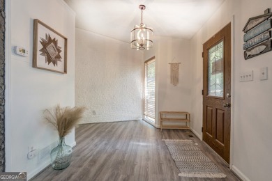 Completely renovated waterfront ranch home with a fully finished on Turtle Cove Golf Course in Georgia - for sale on GolfHomes.com, golf home, golf lot