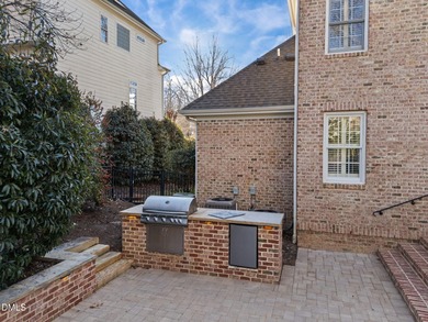 Welcome to 219 Brown Bear, a stately brick colonial residence in on The Preserve At Jordan Lake Golf Club in North Carolina - for sale on GolfHomes.com, golf home, golf lot