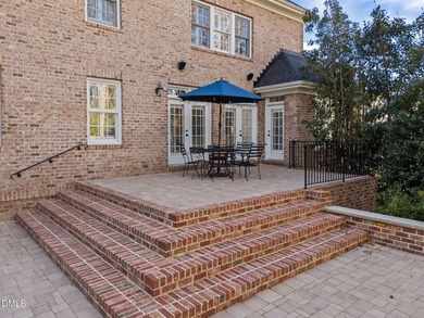 Welcome to 219 Brown Bear, a stately brick colonial residence in on The Preserve At Jordan Lake Golf Club in North Carolina - for sale on GolfHomes.com, golf home, golf lot