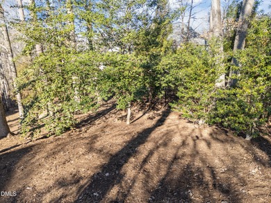 Welcome to 219 Brown Bear, a stately brick colonial residence in on The Preserve At Jordan Lake Golf Club in North Carolina - for sale on GolfHomes.com, golf home, golf lot