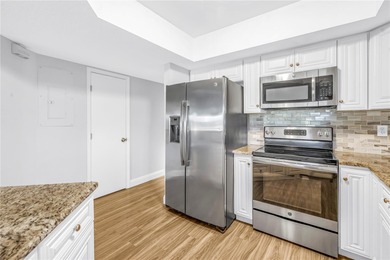 You don't want to miss this beautiful three-story townhouse on Pasadena Yacht and Country Club in Florida - for sale on GolfHomes.com, golf home, golf lot