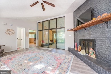 Completely renovated waterfront ranch home with a fully finished on Turtle Cove Golf Course in Georgia - for sale on GolfHomes.com, golf home, golf lot