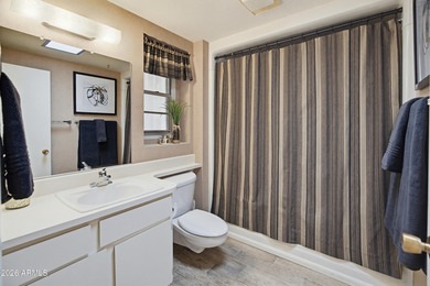 Enter through a charming iron-gated private courtyard that sets on Pebblebrook Golf Course in Arizona - for sale on GolfHomes.com, golf home, golf lot