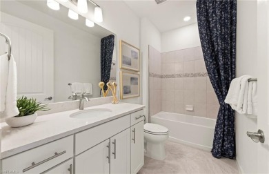 This stunning Hallmark Home Plan offers three spacious bedrooms on Valencia Golf and Country Club in Florida - for sale on GolfHomes.com, golf home, golf lot
