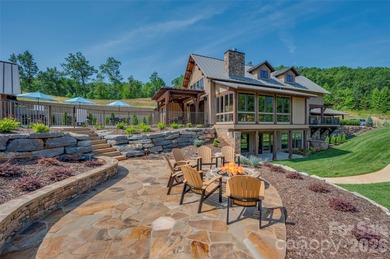 Private lot with mountain & golf course views in the highly on Brights Creek Golf Course in North Carolina - for sale on GolfHomes.com, golf home, golf lot