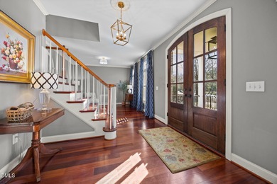 Welcome to 219 Brown Bear, a stately brick colonial residence in on The Preserve At Jordan Lake Golf Club in North Carolina - for sale on GolfHomes.com, golf home, golf lot