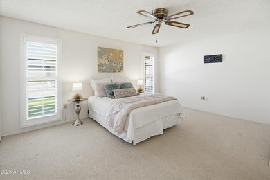 Enter through a charming iron-gated private courtyard that sets on Pebblebrook Golf Course in Arizona - for sale on GolfHomes.com, golf home, golf lot