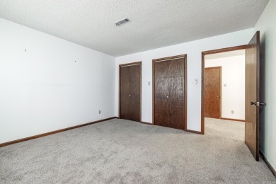 Spacious home looking for new family. Living room with vaulted on DeSoto Golf Course in Arkansas - for sale on GolfHomes.com, golf home, golf lot