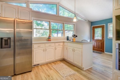 Completely renovated waterfront ranch home with a fully finished on Turtle Cove Golf Course in Georgia - for sale on GolfHomes.com, golf home, golf lot