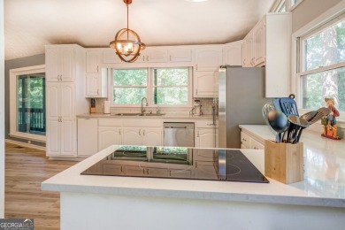 Completely renovated waterfront ranch home with a fully finished on Turtle Cove Golf Course in Georgia - for sale on GolfHomes.com, golf home, golf lot