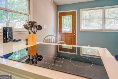 Completely renovated waterfront ranch home with a fully finished on Turtle Cove Golf Course in Georgia - for sale on GolfHomes.com, golf home, golf lot