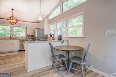 Completely renovated waterfront ranch home with a fully finished on Turtle Cove Golf Course in Georgia - for sale on GolfHomes.com, golf home, golf lot