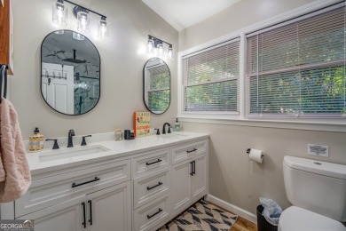 Completely renovated waterfront ranch home with a fully finished on Turtle Cove Golf Course in Georgia - for sale on GolfHomes.com, golf home, golf lot