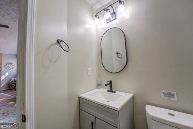 Completely renovated waterfront ranch home with a fully finished on Turtle Cove Golf Course in Georgia - for sale on GolfHomes.com, golf home, golf lot